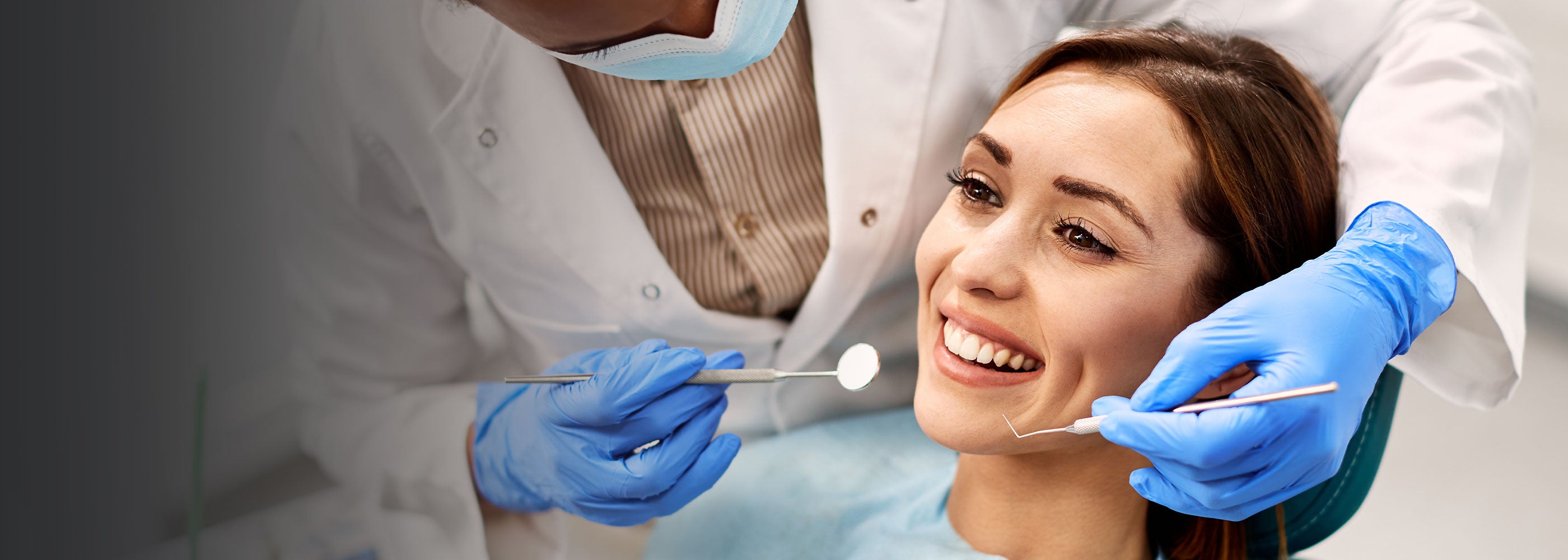 Nervous patient receiving dental treatment