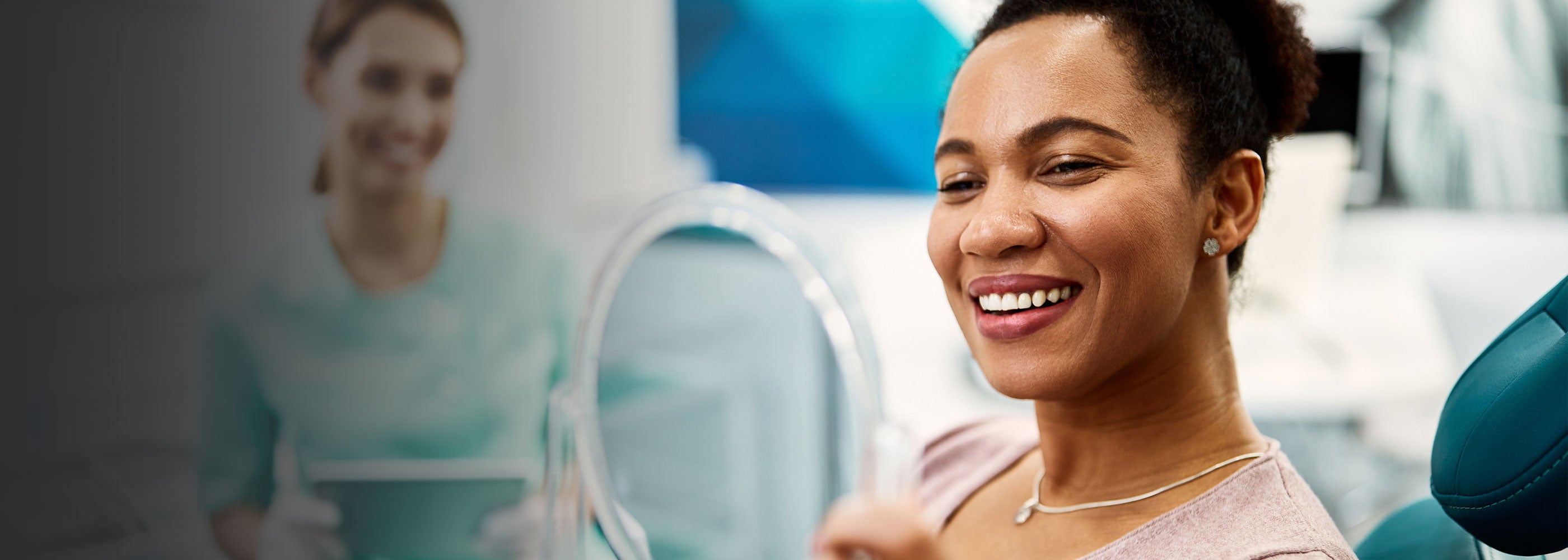 Happy patient visiting the dentist