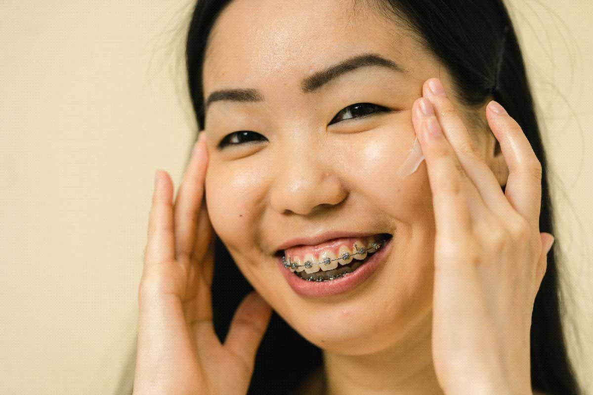 adult with orthodontic braces
