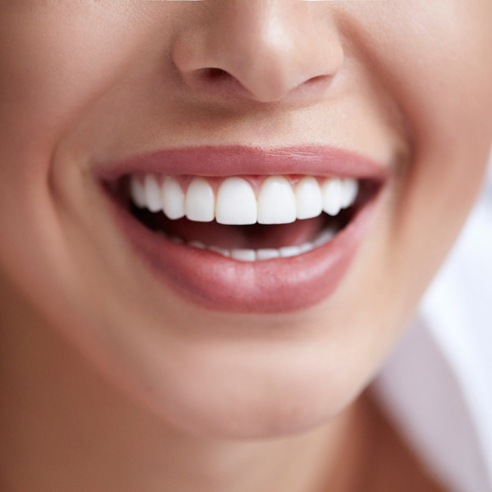Teeth whitening - patient with white teeth